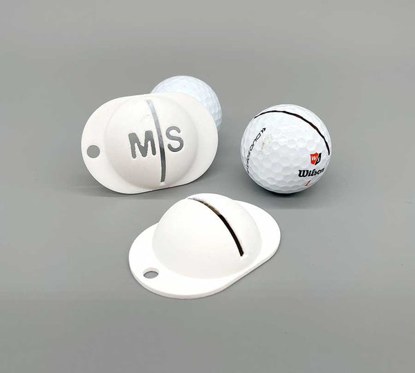 Golf ball marking with optional text