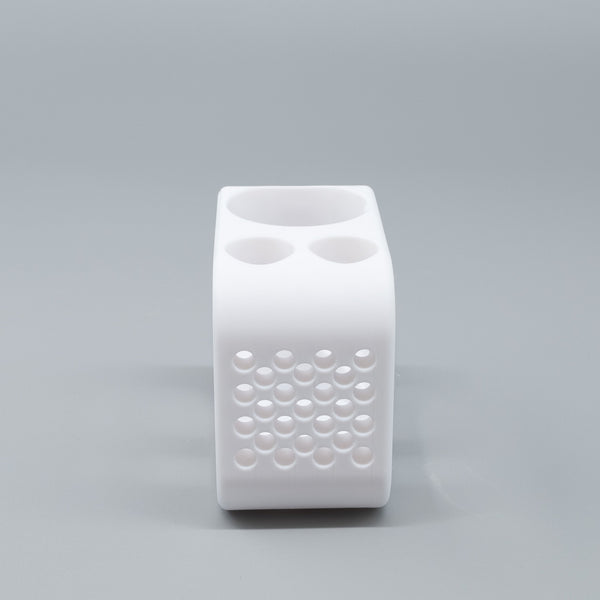 Toothbrush and toothpaste holder