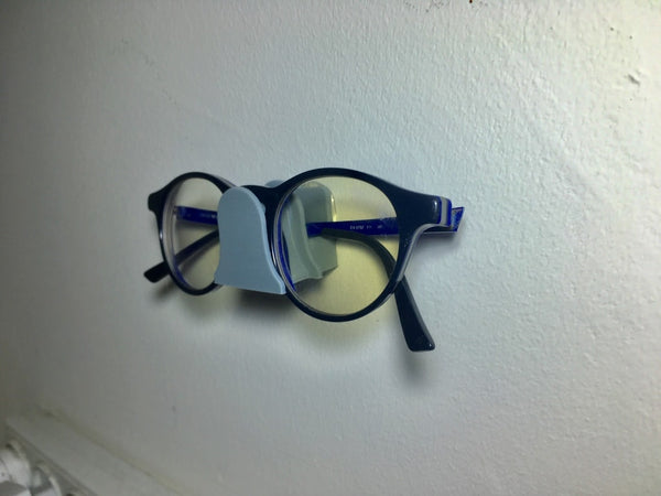 Wall-mounted glasses holder