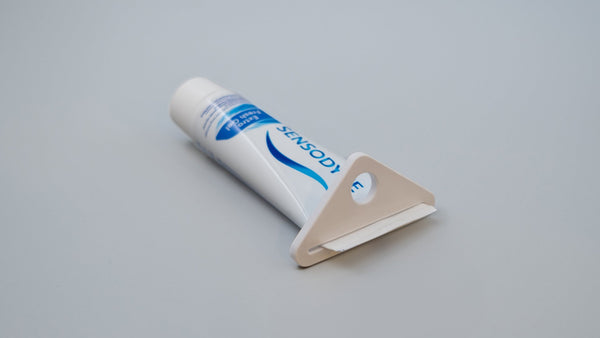 Toothpaste squeezer